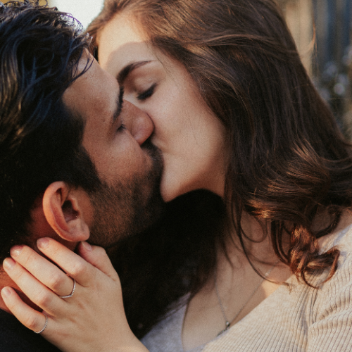 Couple Kissing, Showing Genuine Emotion